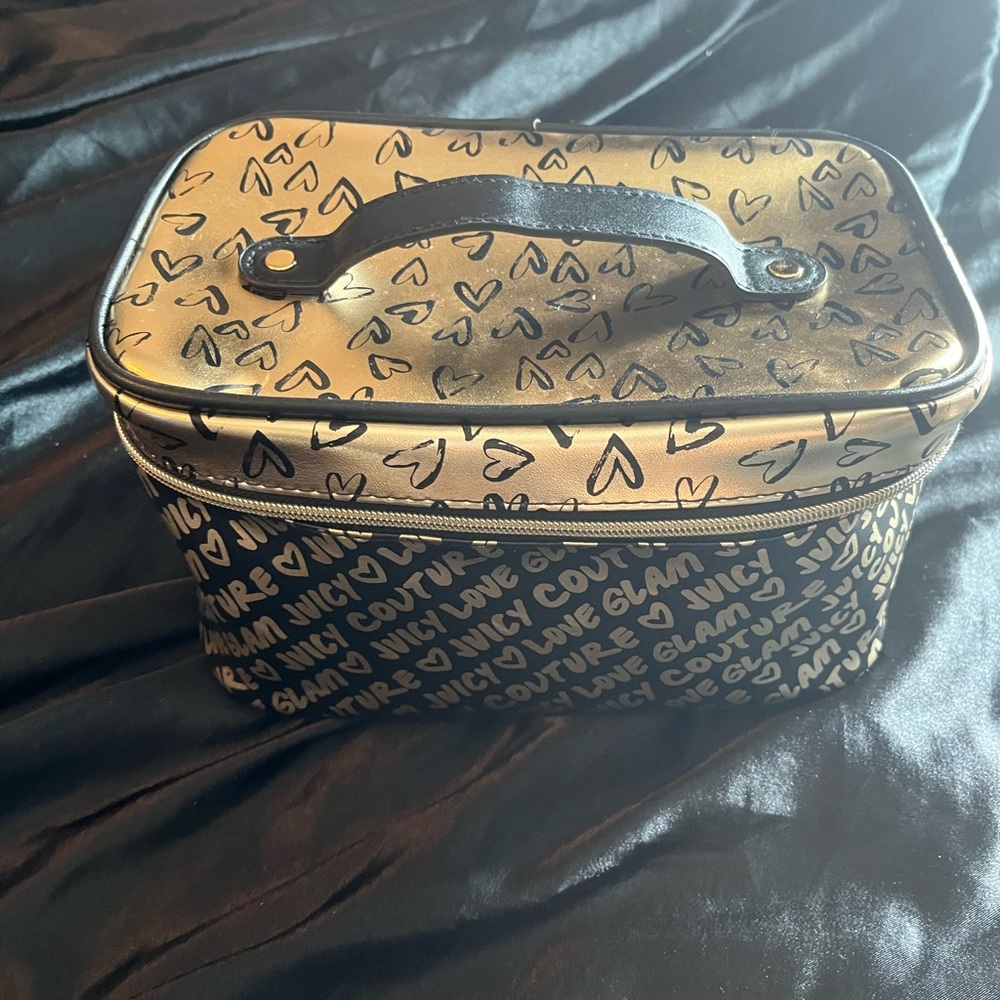 Juicy couture makeup bag. It’s new just without the tag